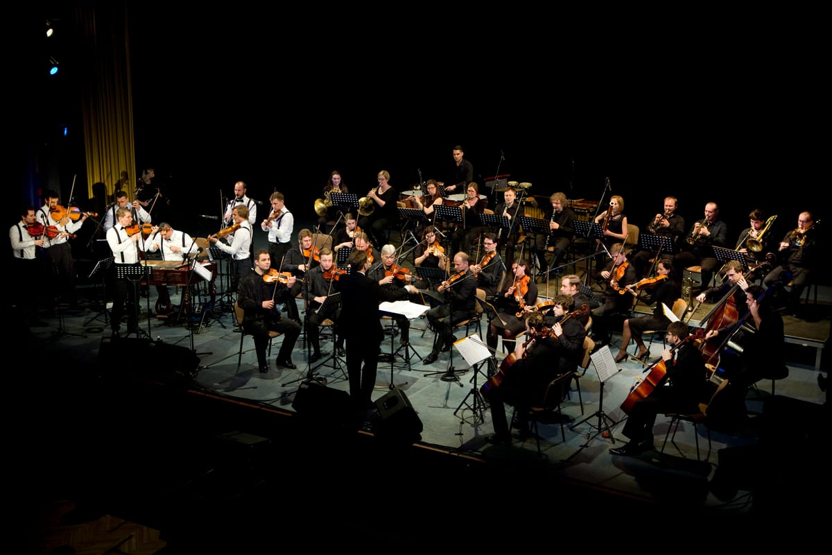 Harafica with a symphony orchestra on stage